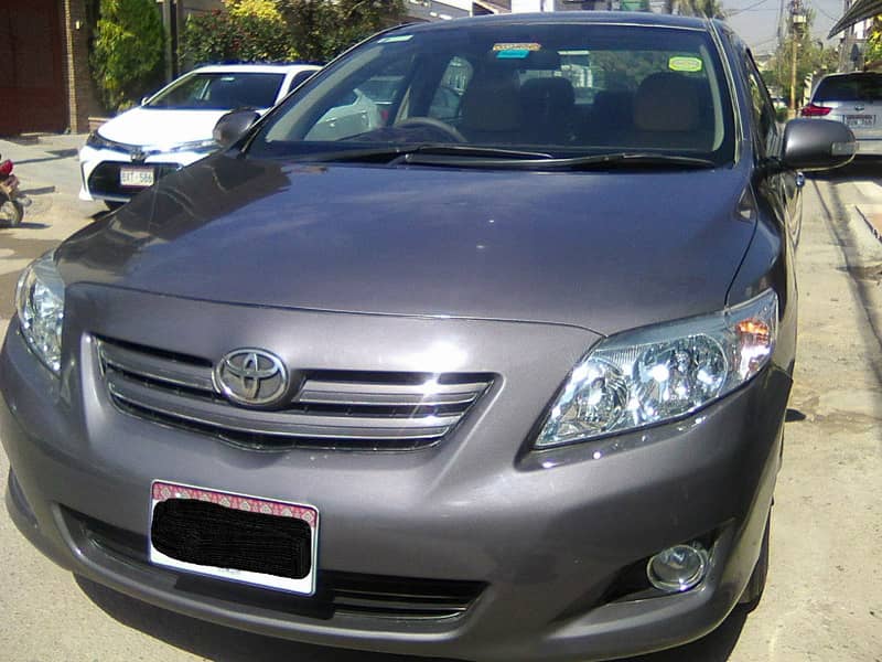 TOYOTA COROLLA GLi MODEL 2009 METALLIC GREY COLOUR BEHTREEN CONDITION 4