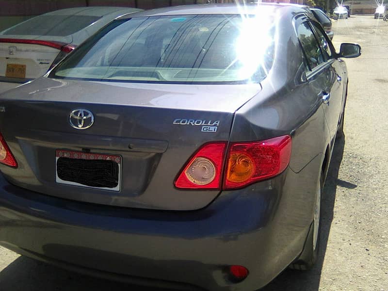 TOYOTA COROLLA GLi MODEL 2009 METALLIC GREY COLOUR BEHTREEN CONDITION 3