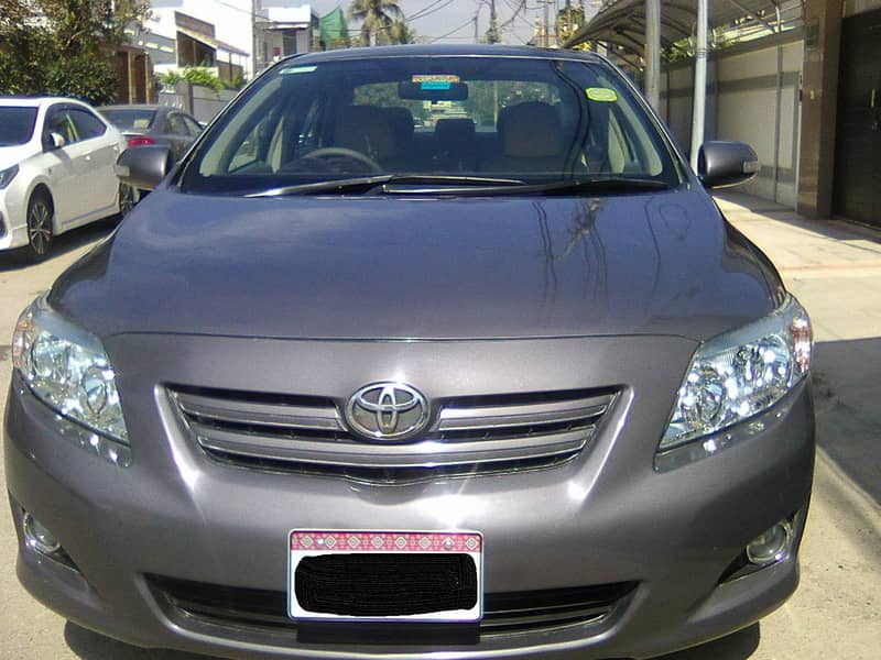 TOYOTA COROLLA GLi MODEL 2009 METALLIC GREY COLOUR BEHTREEN CONDITION 0