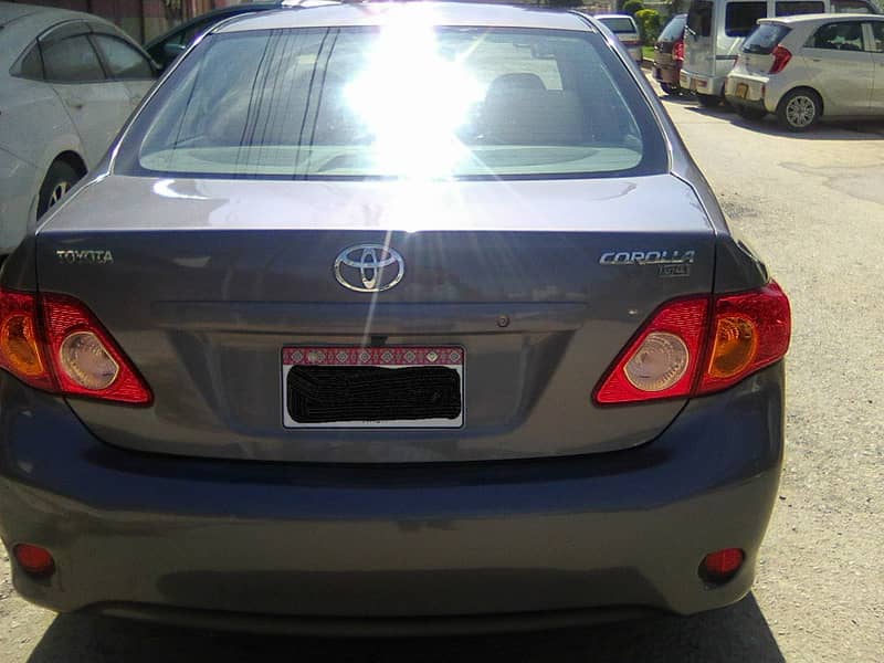 TOYOTA COROLLA GLi MODEL 2009 METALLIC GREY COLOUR BEHTREEN CONDITION 7