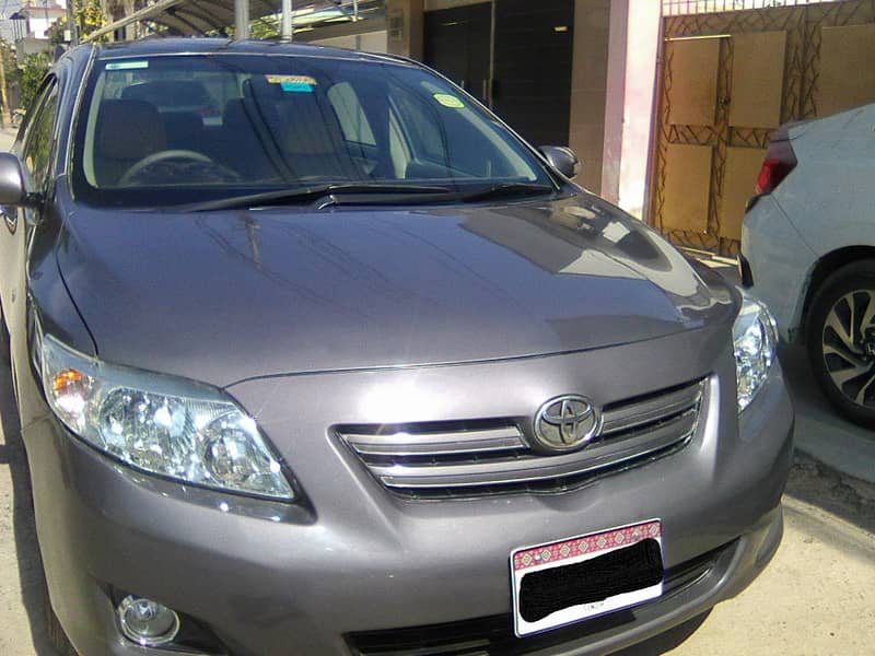 TOYOTA COROLLA GLi MODEL 2009 METALLIC GREY COLOUR BEHTREEN CONDITION 8