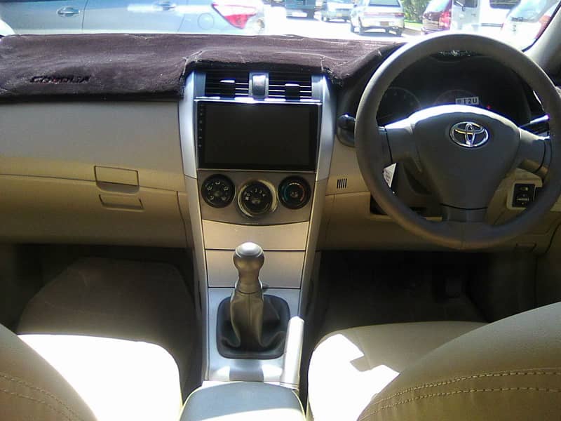 TOYOTA COROLLA GLi MODEL 2009 METALLIC GREY COLOUR BEHTREEN CONDITION 9