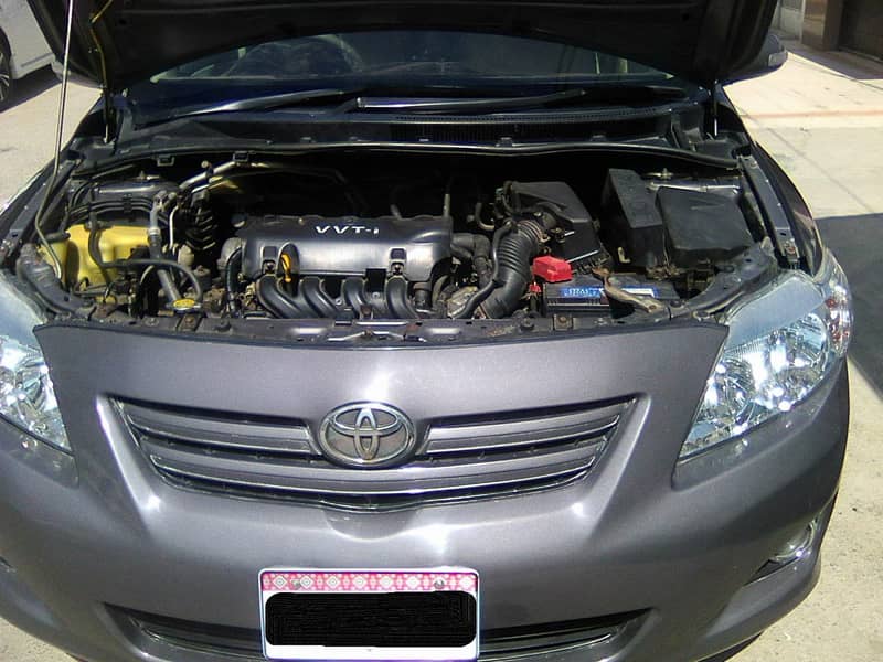 TOYOTA COROLLA GLi MODEL 2009 METALLIC GREY COLOUR BEHTREEN CONDITION 10