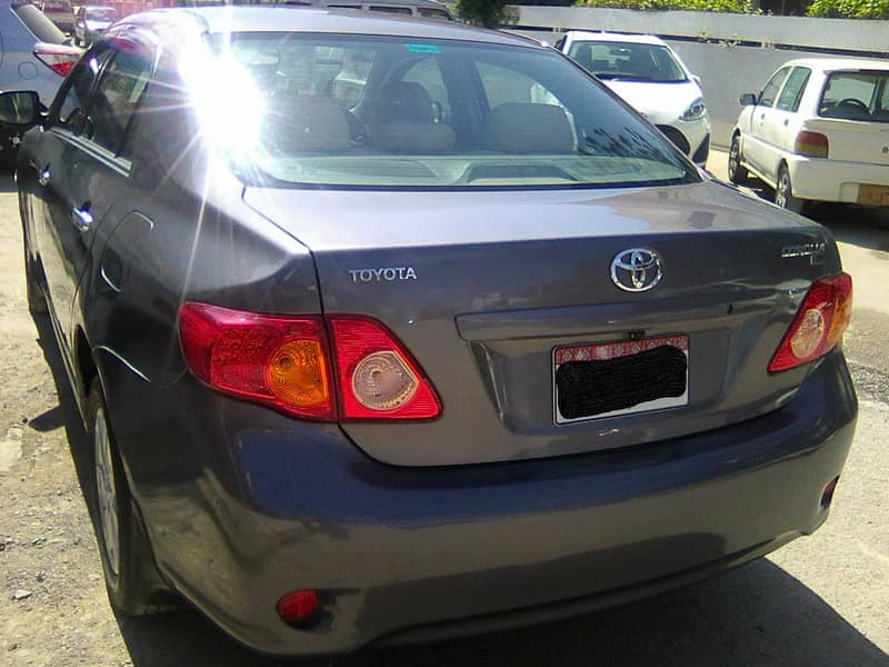 TOYOTA COROLLA GLi MODEL 2009 METALLIC GREY COLOUR BEHTREEN CONDITION 11