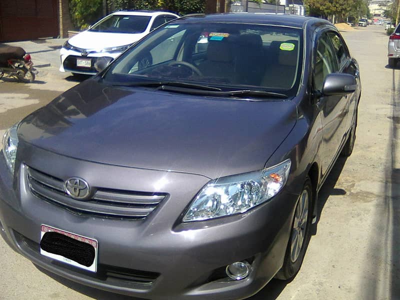 TOYOTA COROLLA GLi MODEL 2009 METALLIC GREY COLOUR BEHTREEN CONDITION 12