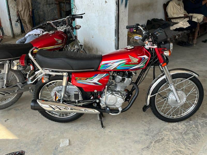 Honda 125 model 2023 ha bilkul new condition ha 8