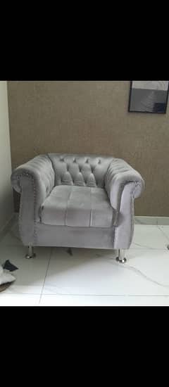 greyish silver sofa