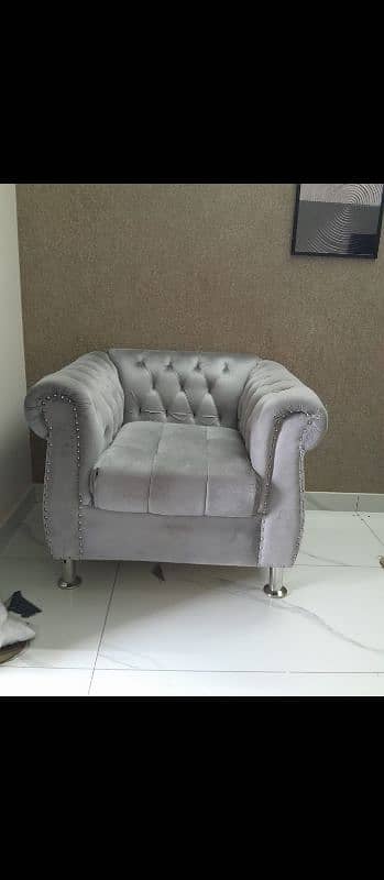 greyish silver sofa 0