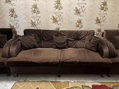 Dark brown sofa set with free rug