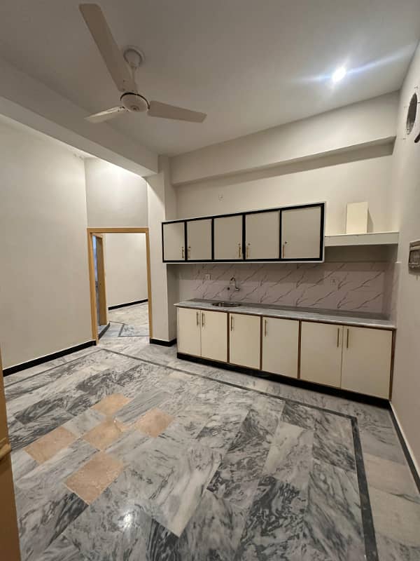 BRAND NEW Family flat for rent 2bed tv lounge 2bath kitchen pani boring 24 hours bijli miter separate location yousaf colony 4