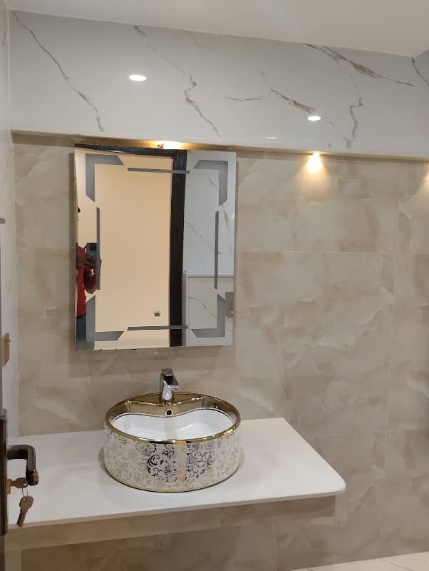 10 Marla Brand New Fully Luxury Hosue Available for rent in the Heart of bahria town lahore 7