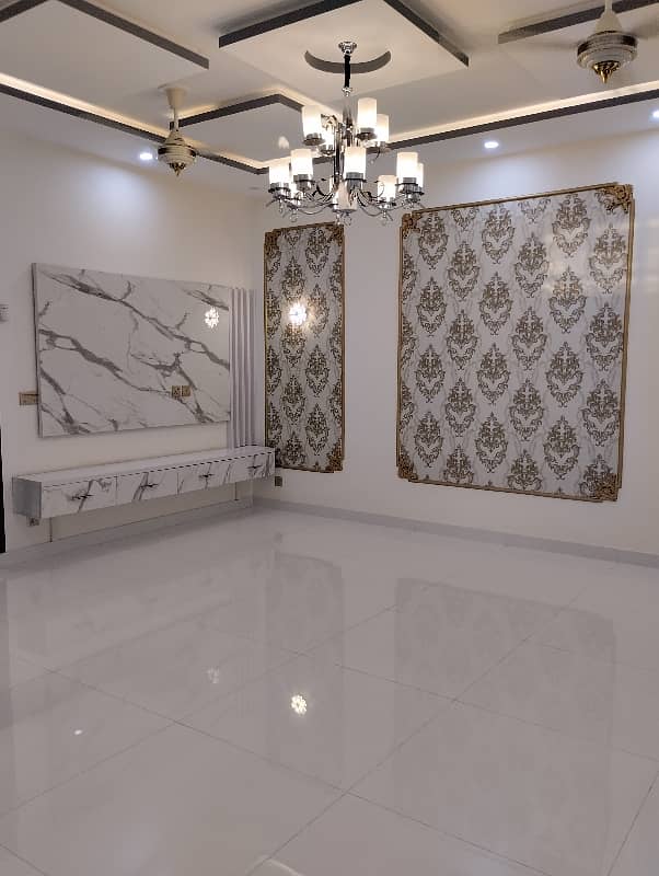 10 Marla Brand New Fully Luxury Hosue Available for rent in the Heart of bahria town lahore 10