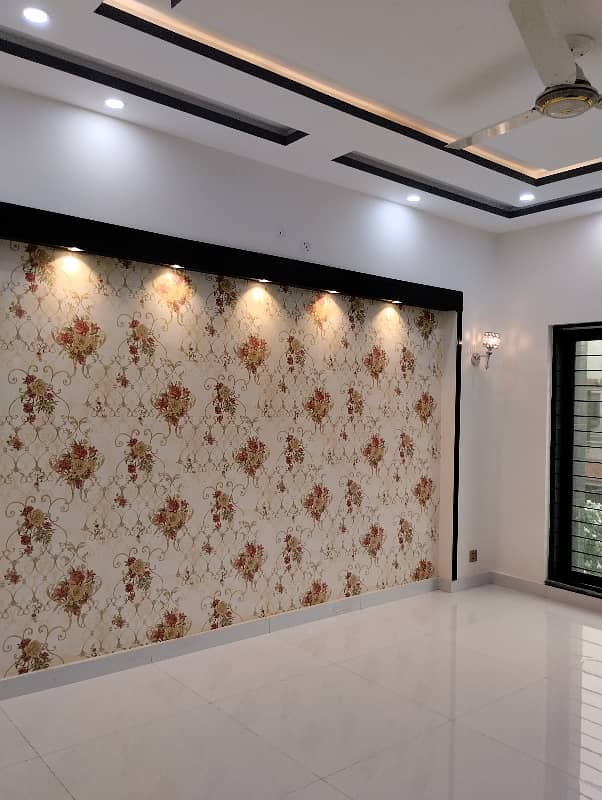 10 Marla Brand New Fully Luxury Hosue Available for rent in the Heart of bahria town lahore 11