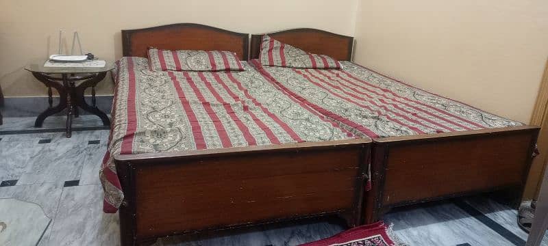 two single beds with mattress. . contact on 03335170180 2