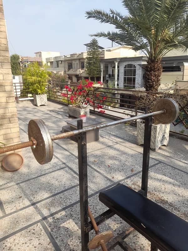 workout bench with barbells,dumbbells and weights 2