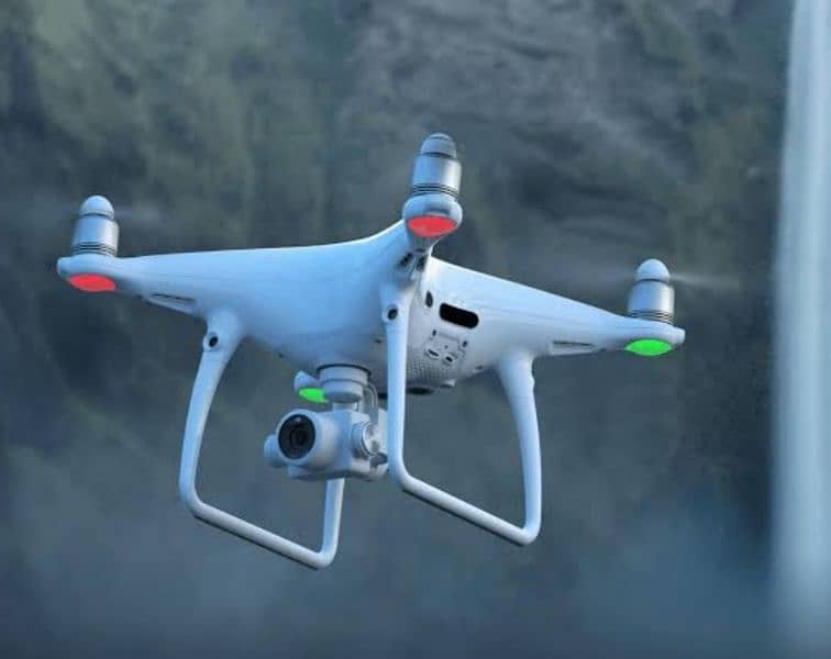 DJI PHANTOM 4 PRO DRONE price km ho jaygi urgent sale exchang possible 5