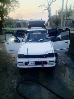 Suzuki Mehran VX 1990-0.3. 0.7. 8.7. 7.4. 4.1. 9