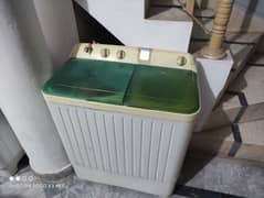 Haier washing machine in working condition.