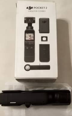 DJI Osmo Pocket 2 Creator Kit Brand New only box open never use at all