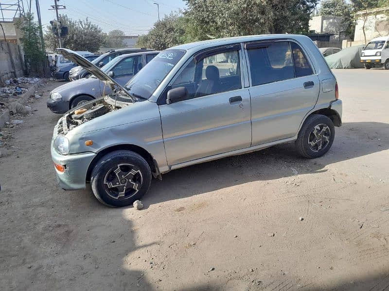 Daihatsu Cuore 2008( Total original) 13