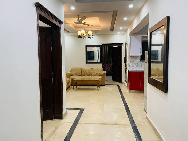 F-11 Markaz 2 Bed Attached Bath TV Lounge Kitchen Car Parking Fully Furnished Apartment Available For Rent 6