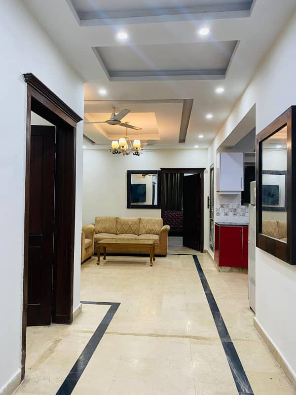 F-11 Markaz 2 Bed Attached Bath TV Lounge Kitchen Car Parking Fully Furnished Apartment Available For Rent 7