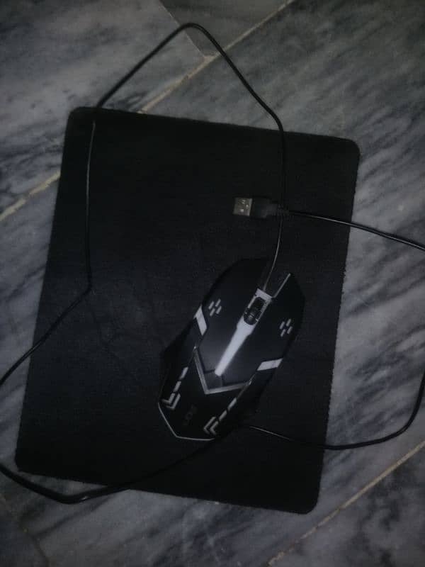 RGB gaming mouse with free mouse pad 4