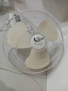 two bracket fans in good condition