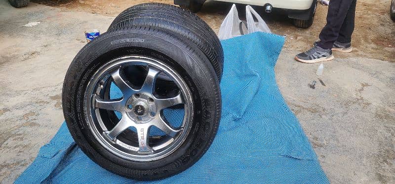 Brand new tyres and alloyrims,195/65-R15 tubless 1