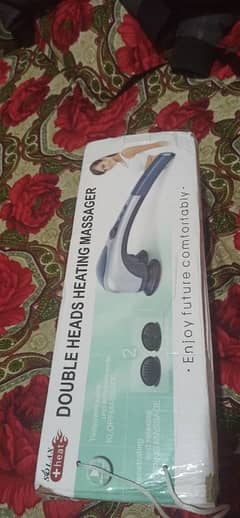 Double heads heating massager