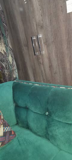 green 5 seater velvet sofa