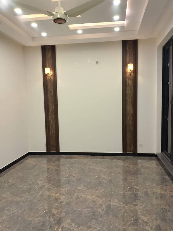 5 Marla 2 badroom upper portion available for rent in dha phase 9 town very good location 11