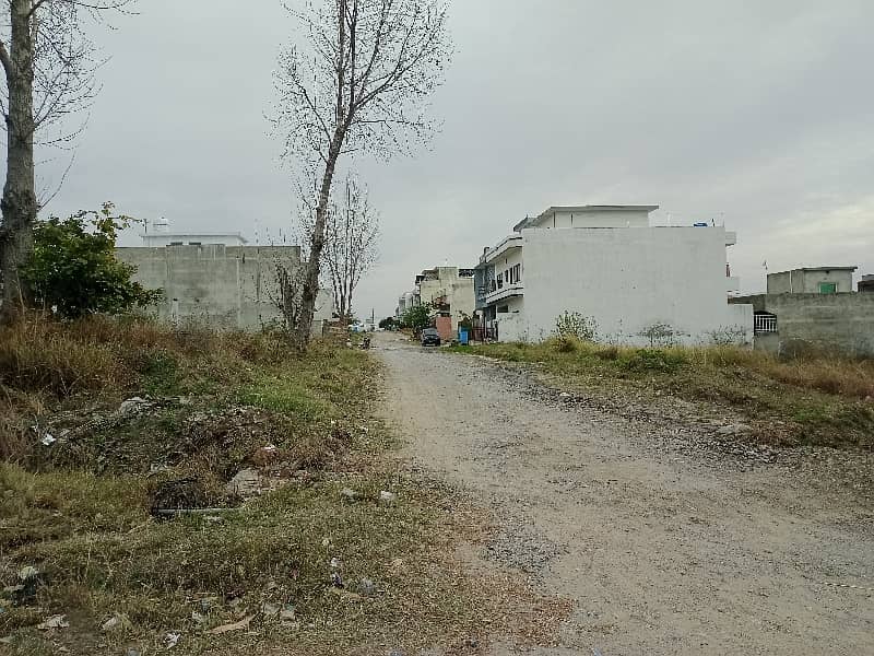 E-18 HECHS Health Enclave Islamabad Plot Surrounded by houses 0