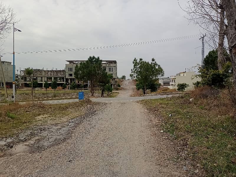 E-18 HECHS Health Enclave Islamabad Plot Surrounded by houses 8