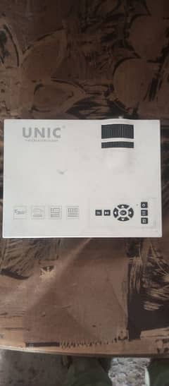 UNIC UC40 plus projector 1080p exchange mobile ke sath