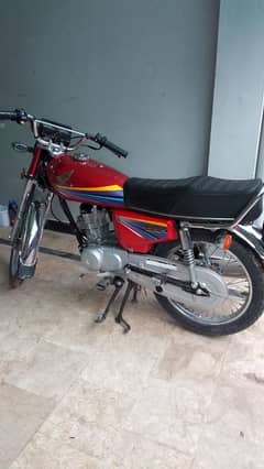 Honda CG 125 model 2012 my WhatsApp number 03079496054