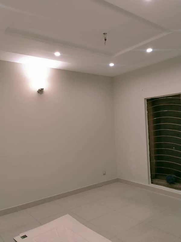 UPPER PORTION OF 10 MARLA GOOD EXCELLENT CONDITION HOUSE FOR RENT IN OVERSEAS A BLOCK BAHRIA TOWN LAHORE 14