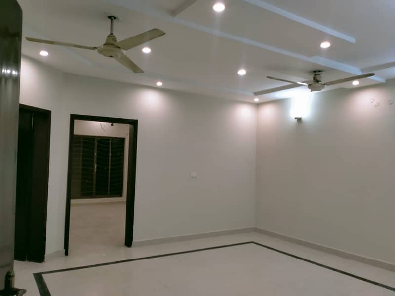 UPPER PORTION OF 10 MARLA GOOD EXCELLENT CONDITION HOUSE FOR RENT IN OVERSEAS A BLOCK BAHRIA TOWN LAHORE 15