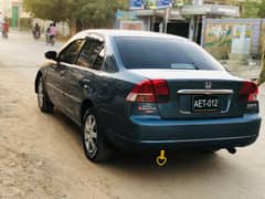 Honda Civic Prosmetic 2003 better than Cultus alto mehran city Corolla