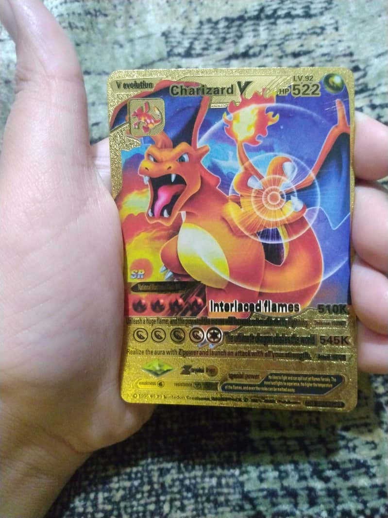 Very good Pokemon golden Charizard card we evolution 1