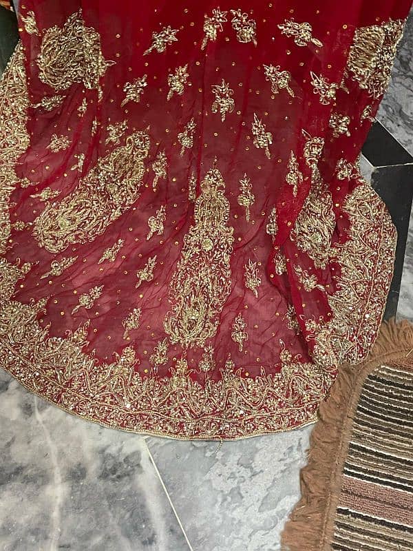 bridal first day lehnga with tail 0