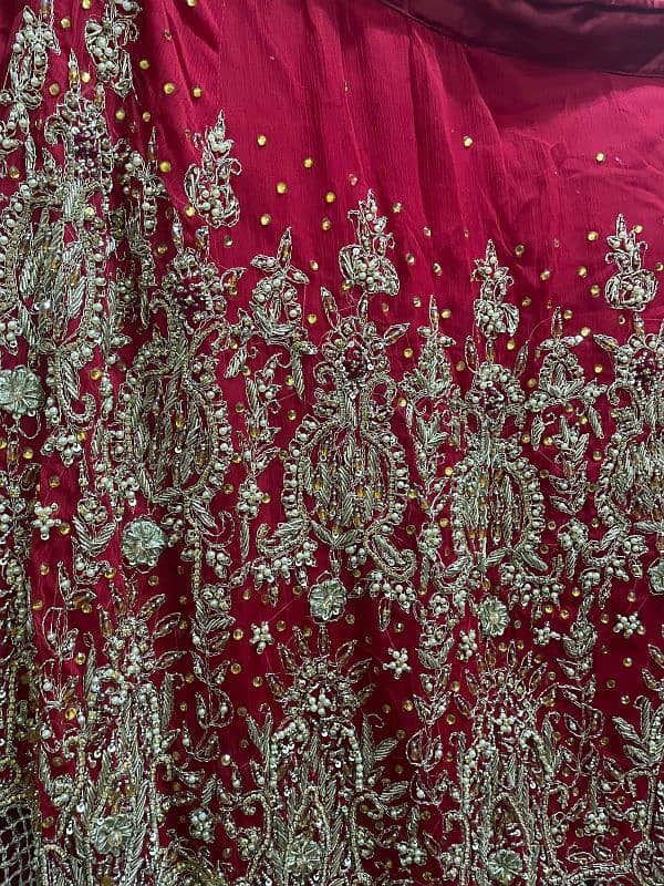 bridal first day lehnga with tail 4