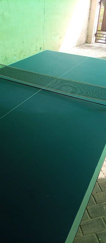 Table Tennis Table with racket, ball and net 1