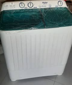 Washing machine and Dryer (Haier).