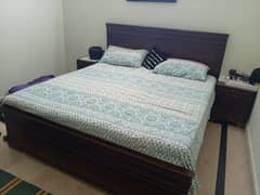 double bed with side tables