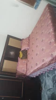 Bed with sidetable and dressing is for sale