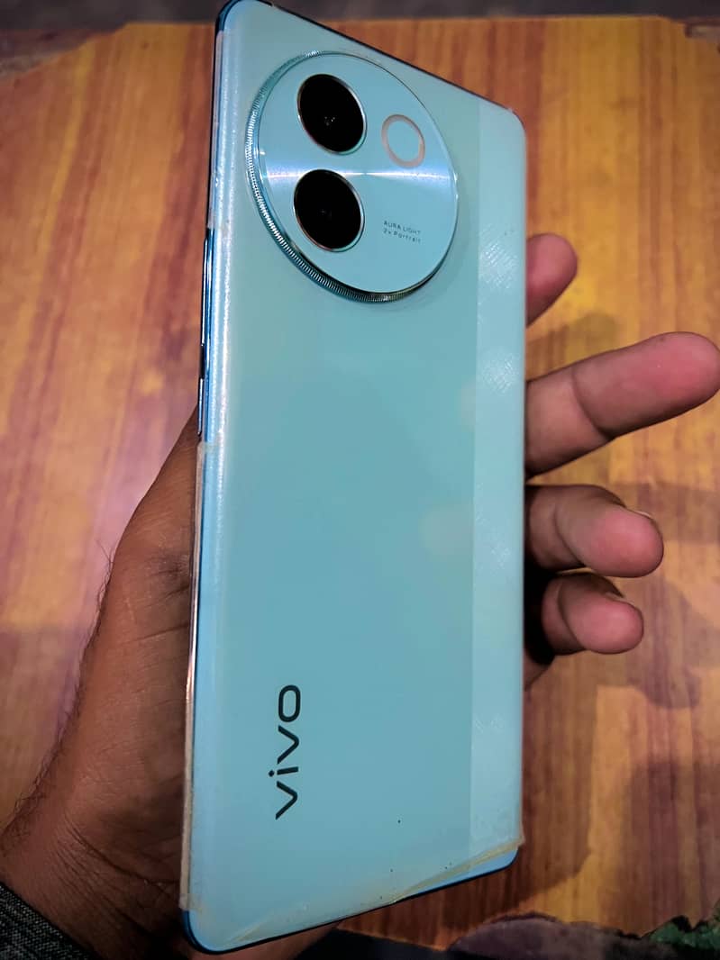 Vivo V 30e slightly used . 1