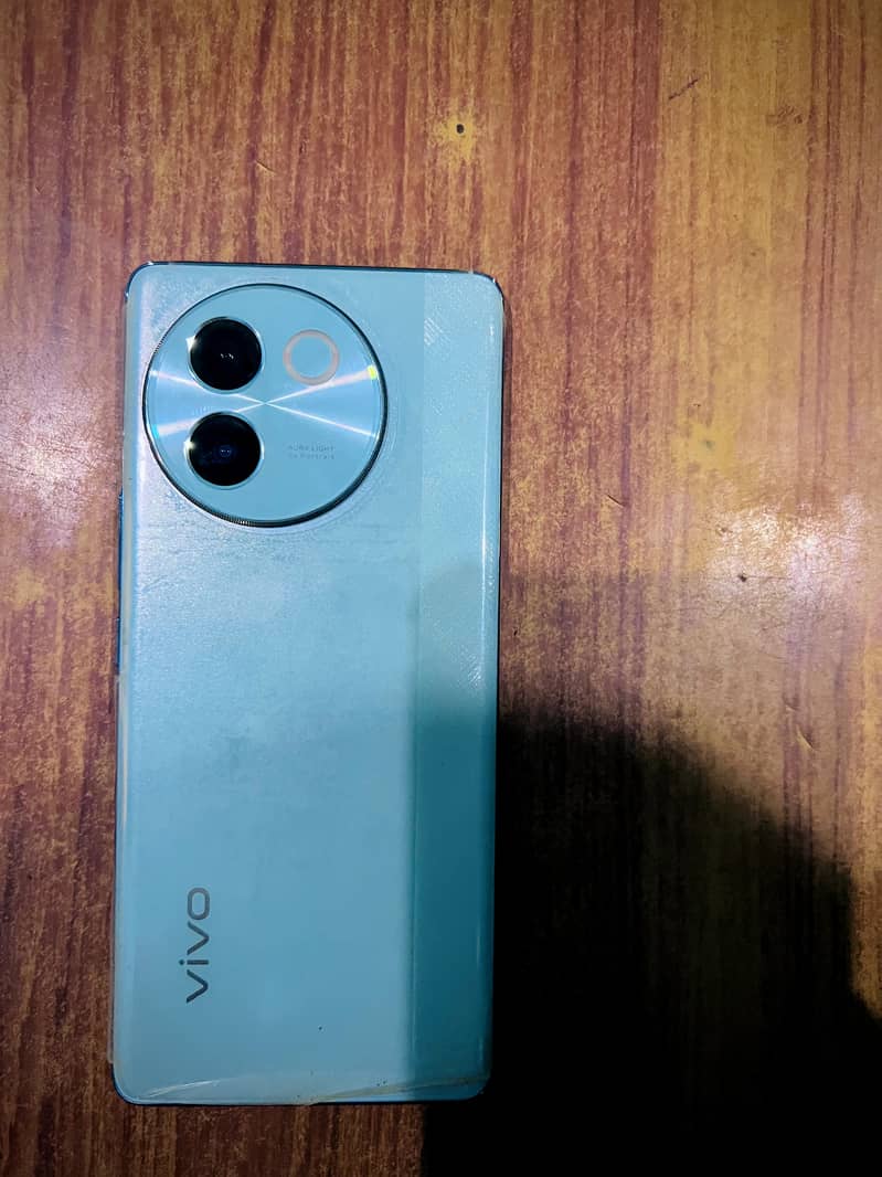 Vivo V 30e slightly used . 5