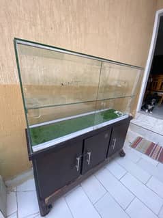 perfume display counter with cupboard storage