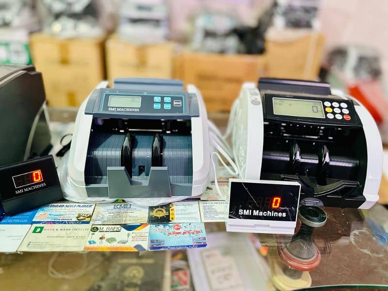 cash counting machine with fake note detection 1 year warranty. 8